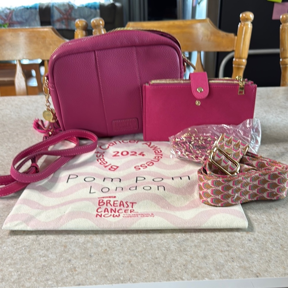 Pink Crossbody Bag with Structured Design and Zipper Closure